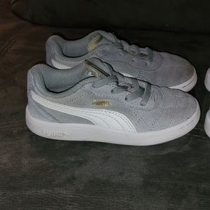 Toddler Puma soccer shoes.